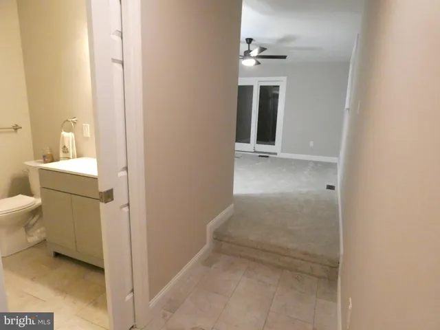 a view of a bathroom with a toilet