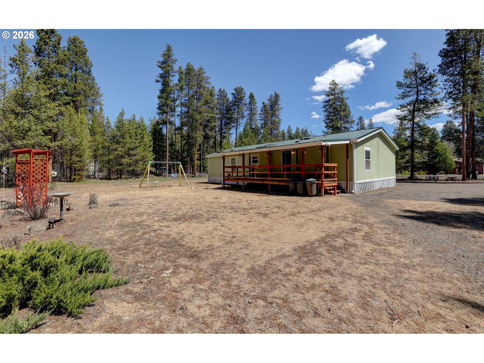 52315 Lechner Lane La Pine, OR 97739 - Photo 4 of 35 a view of outdoor space with trees
