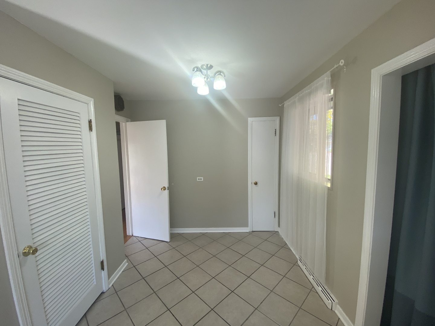 1025 South Dee Road Park Ridge, IL 60068 - Photo 7 of 13 a view of a hallway with wooden floor