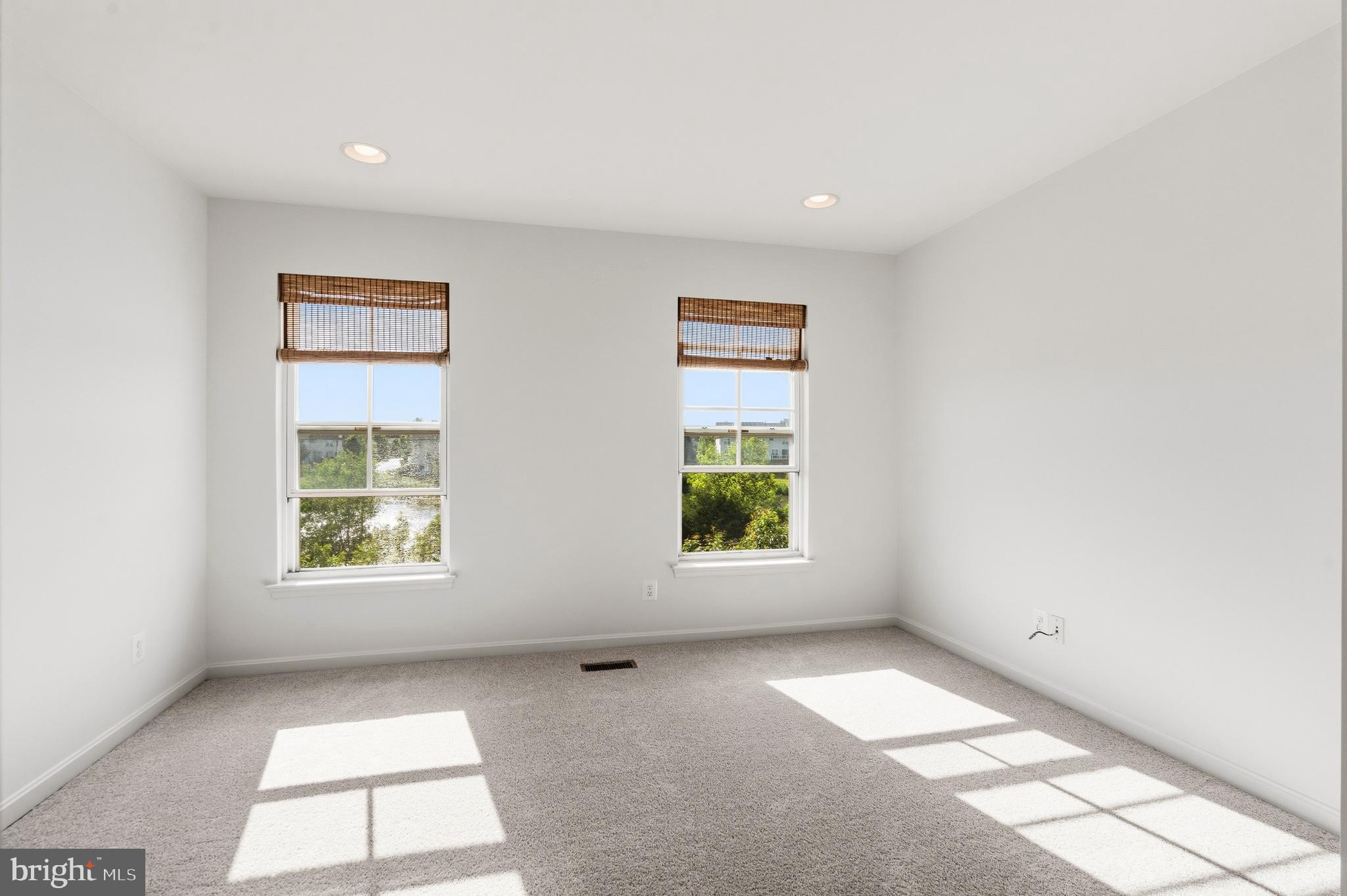 9227 Ribbon Falls Loop Bristow, VA 20136 - Photo 44 of 53 an empty room with windows
