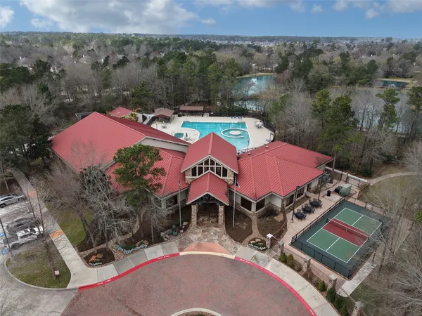 an aerial view of a house with a garden