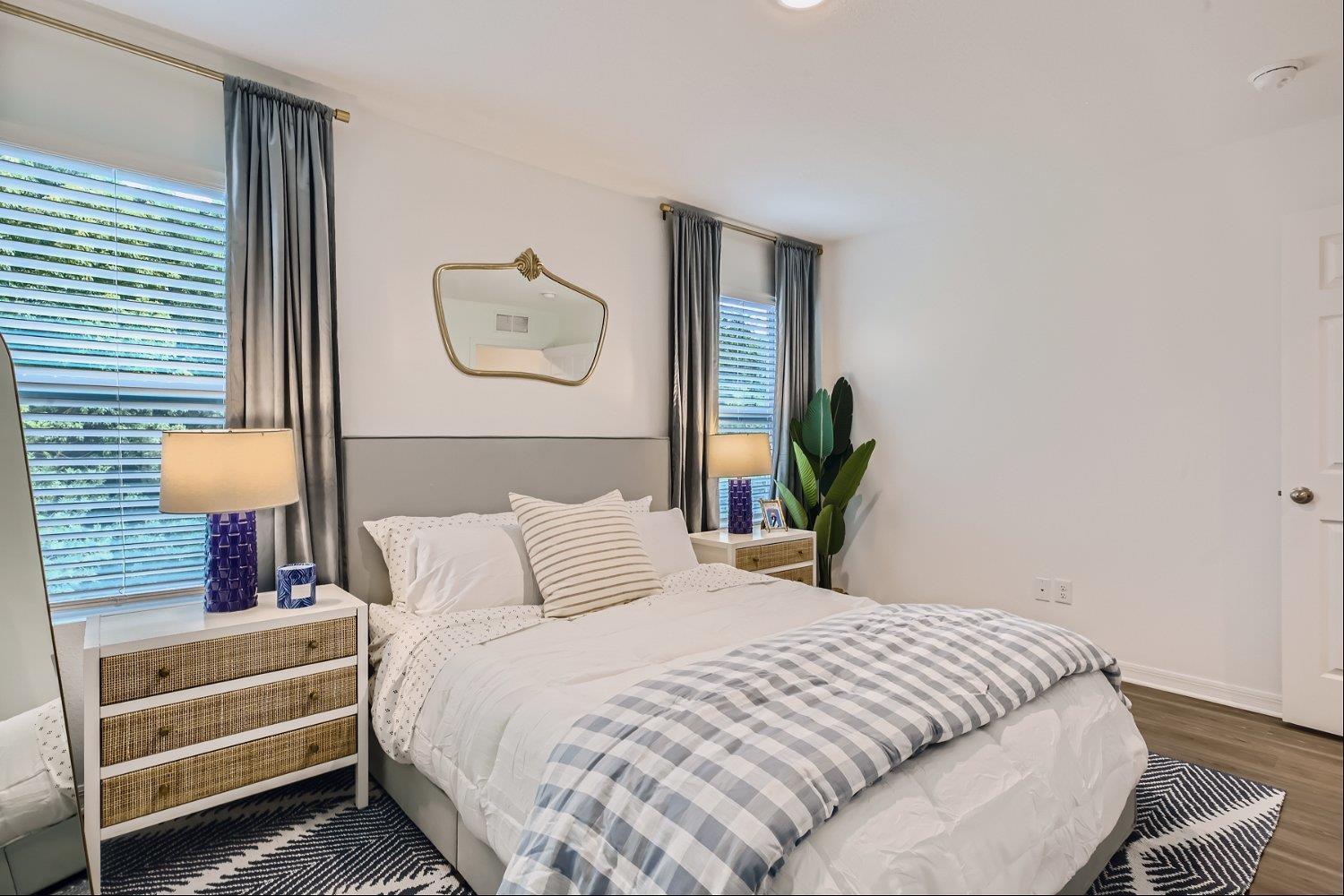 67 Pamplona Drive St. Augustine, FL 32086 - Photo 28 of 66 a bedroom with a bed and a lamp