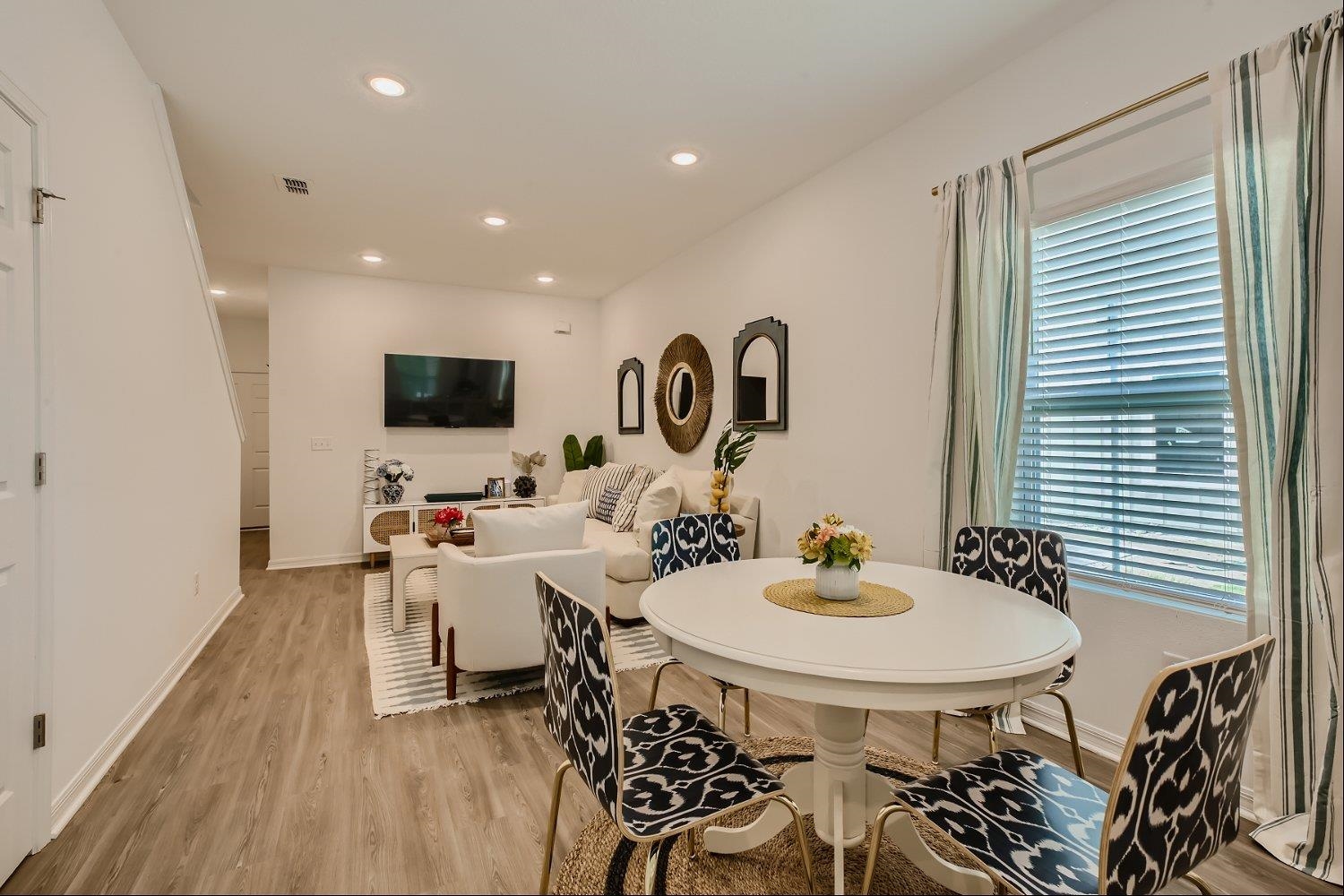 67 Pamplona Drive St. Augustine, FL 32086 - Photo 40 of 66 a view of a dining room with furniture and wooden floor