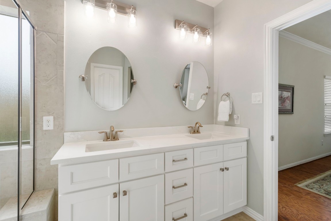 3214 Clover Trace Drive Spring, TX 77386 - Photo 27 of 48 a bathroom with a double vanity sink and a mirror