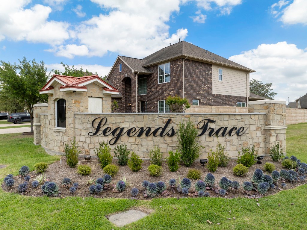 3214 Clover Trace Drive Spring, TX 77386 - Photo 41 of 48 a front view of a house with a garden