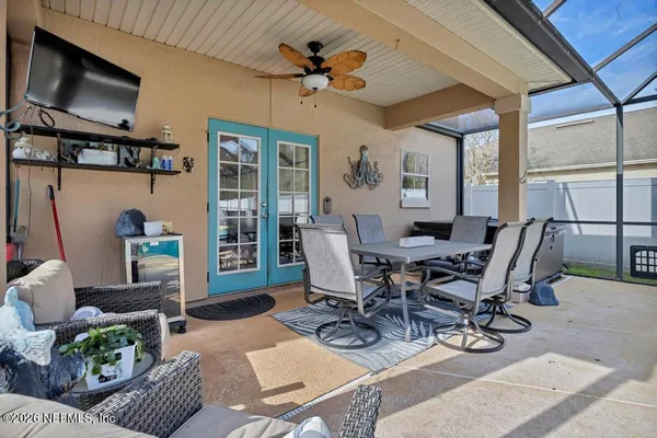 a view of a swimming pool with a patio