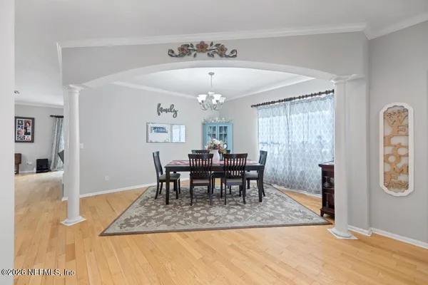 a view of a dining room with furniture