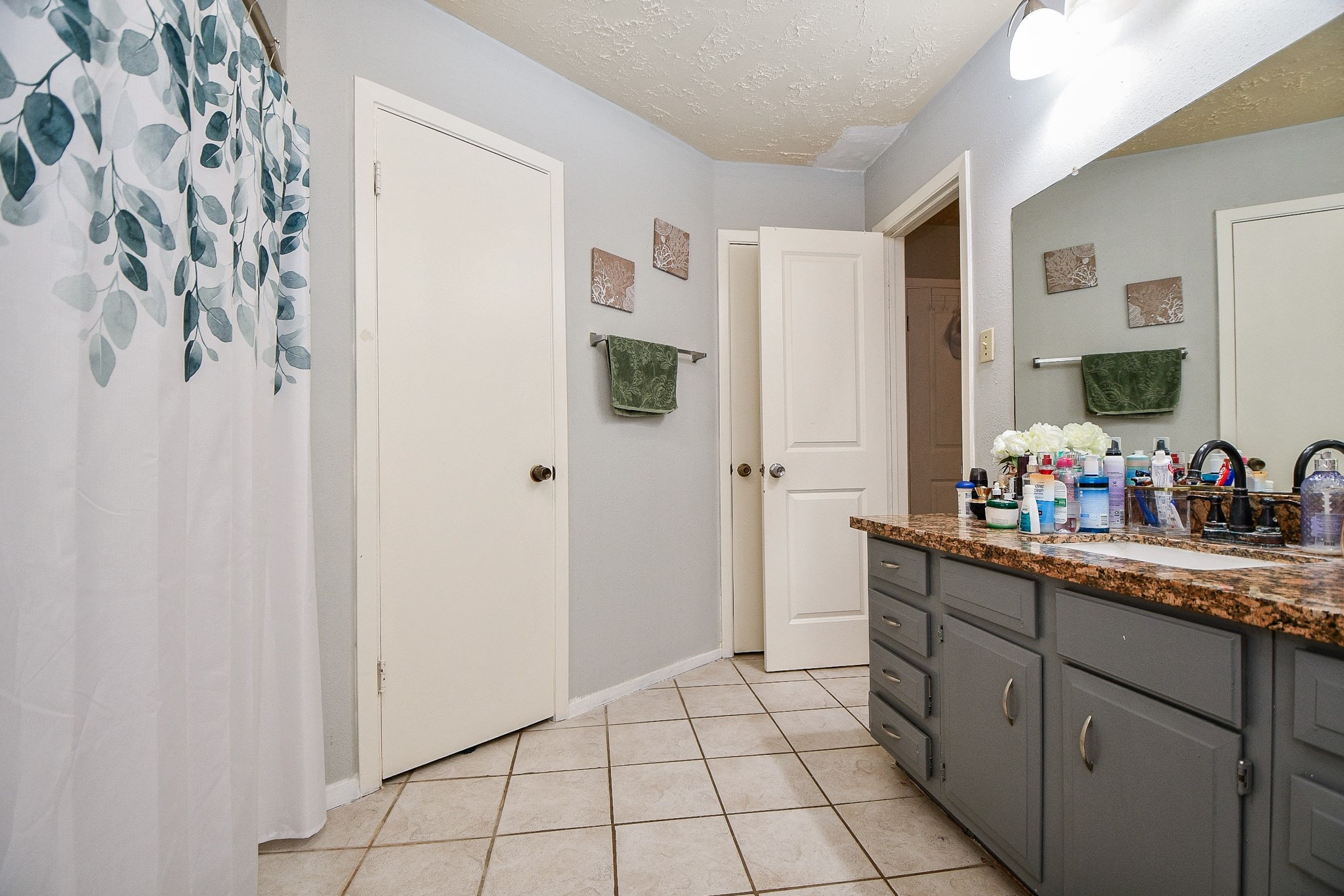 16711 Ribbonridge Drive Sugar Land, TX 77498 - Photo 15 of 24 a kitchen with stainless steel appliances a sink and a refrigerator