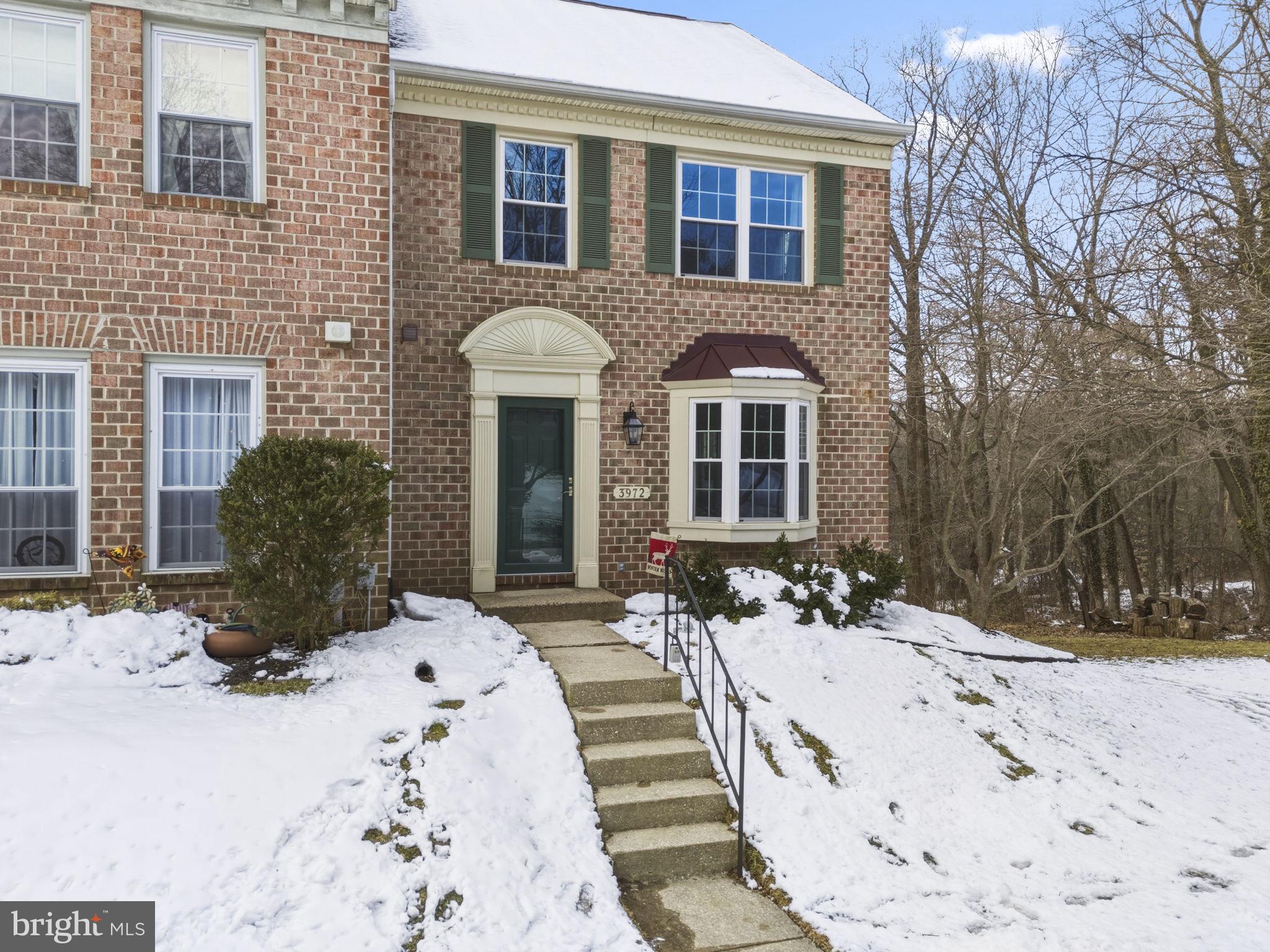 3972 Forest Valley Road Baltimore, MD 21234 - Photo 1 of 1 a view of a brick house with large windows
