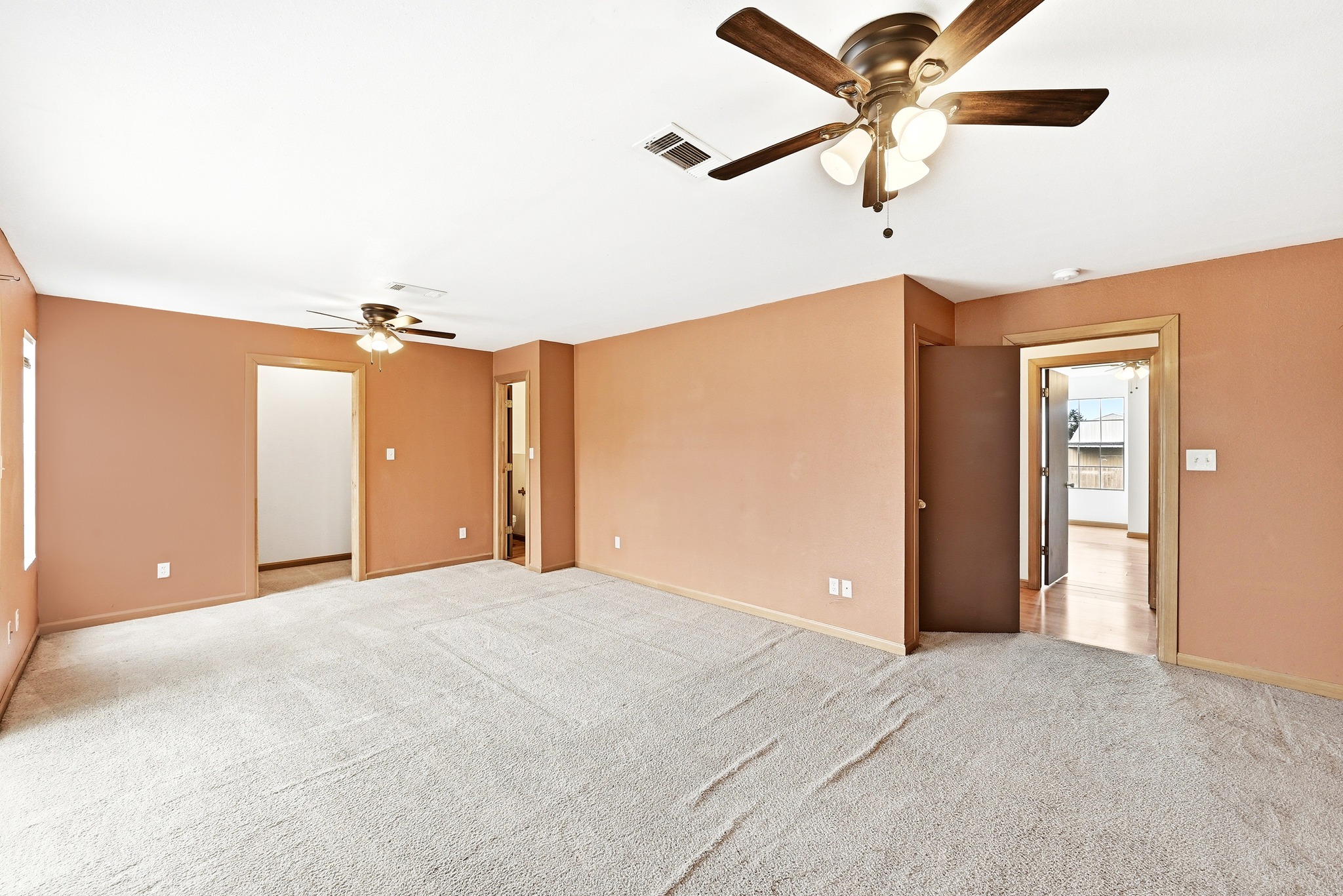 320 Sunset Ridge Maxwell, TX 78656 - Photo 18 of 32 a view of a big room with closet and chandelier fan