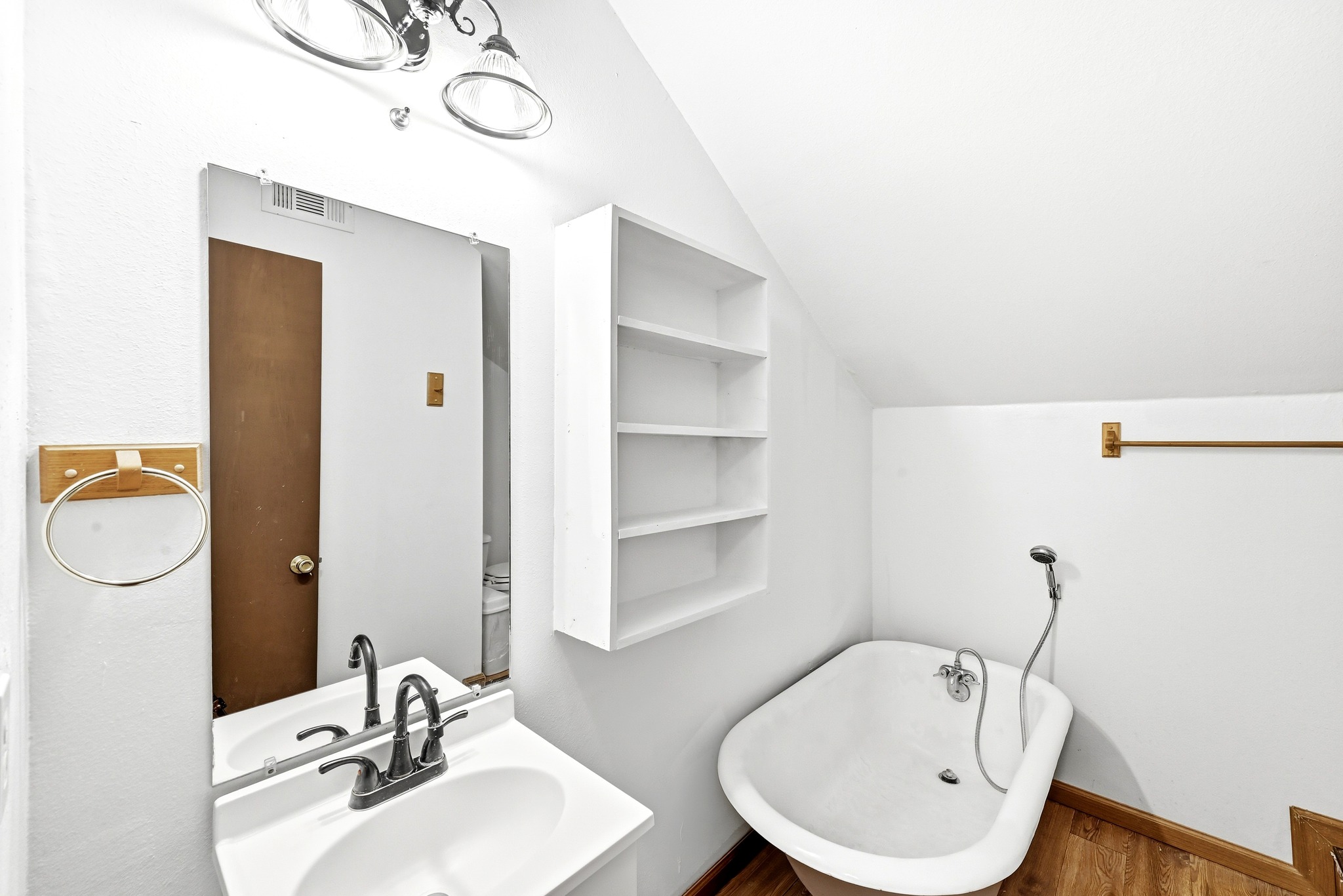 320 Sunset Ridge Maxwell, TX 78656 - Photo 27 of 32 a bathroom with a sink a toilet and a mirror