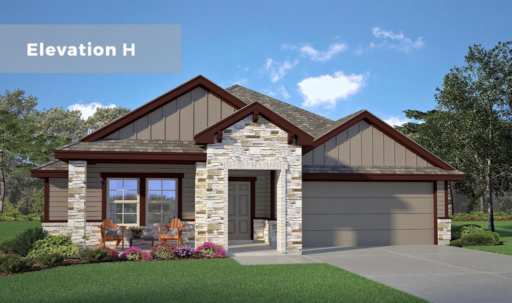 5800 Foggy Lagoon Drive Waco, TX 76708 - Photo 2 of 24 a front view of a house with a yard and garage