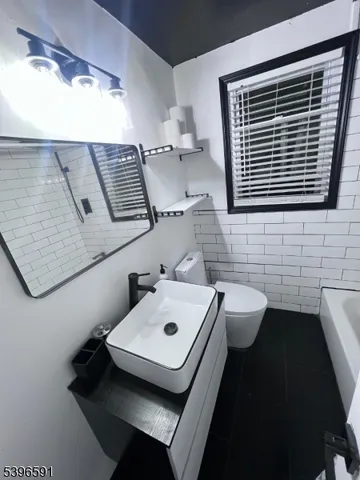 a bathroom with a sink and a toilet