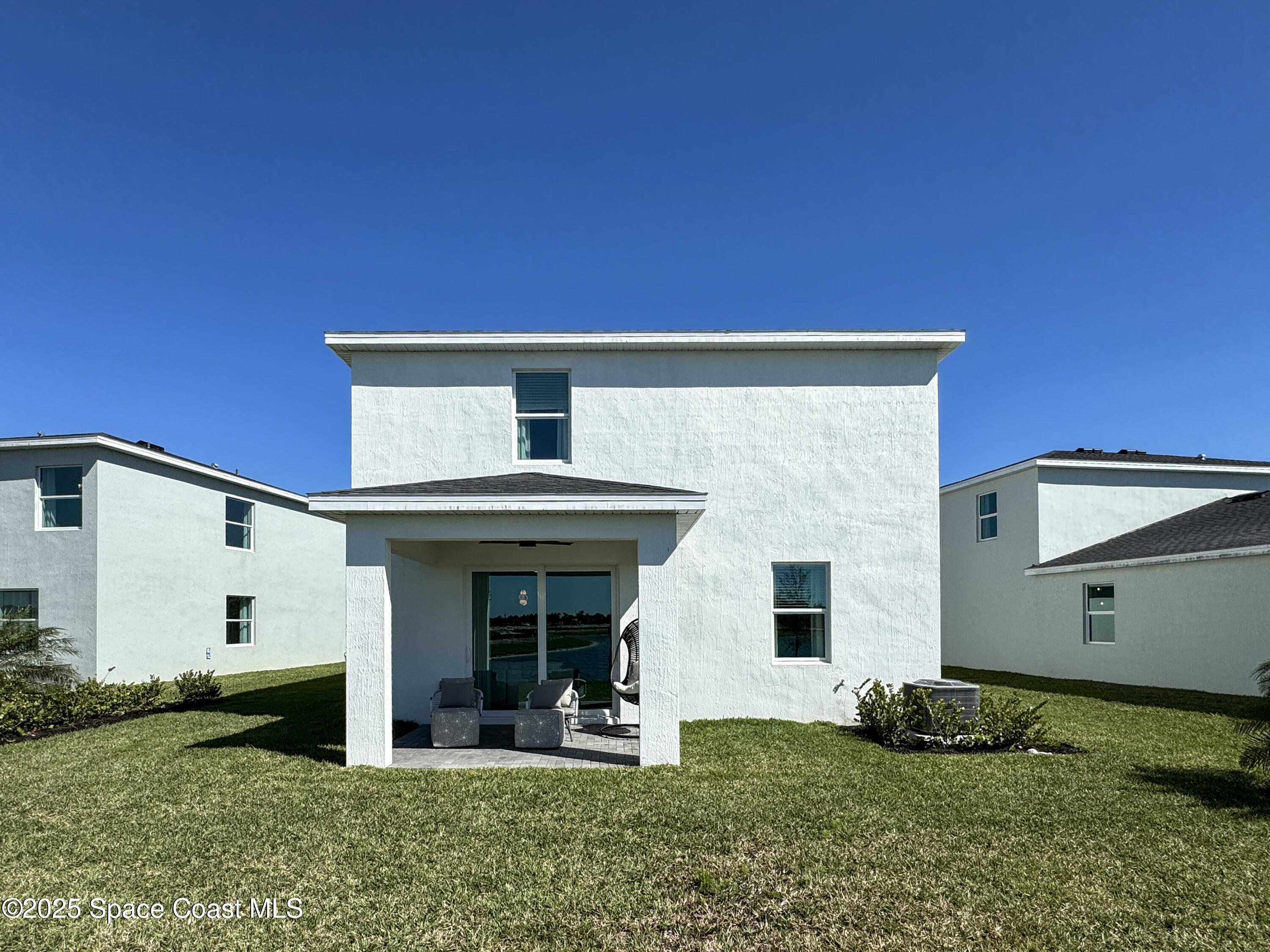 1959 Croft Inlet Drive Palm Bay, FL 32907 - Photo 23 of 23 a view of a house with backyard