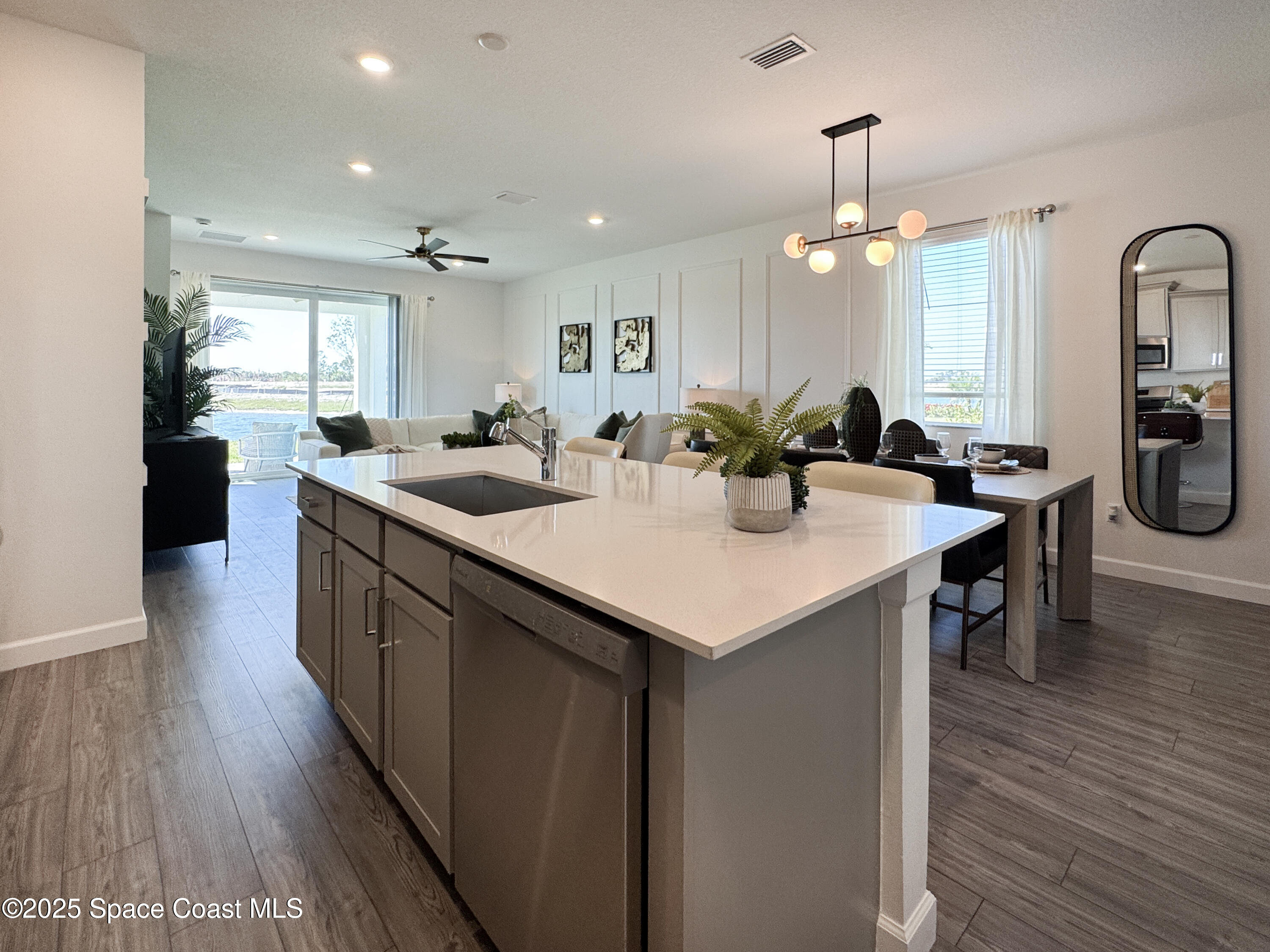 1959 Croft Inlet Drive Palm Bay, FL 32907 - Photo 3 of 23 a view of a kitchen and dining room