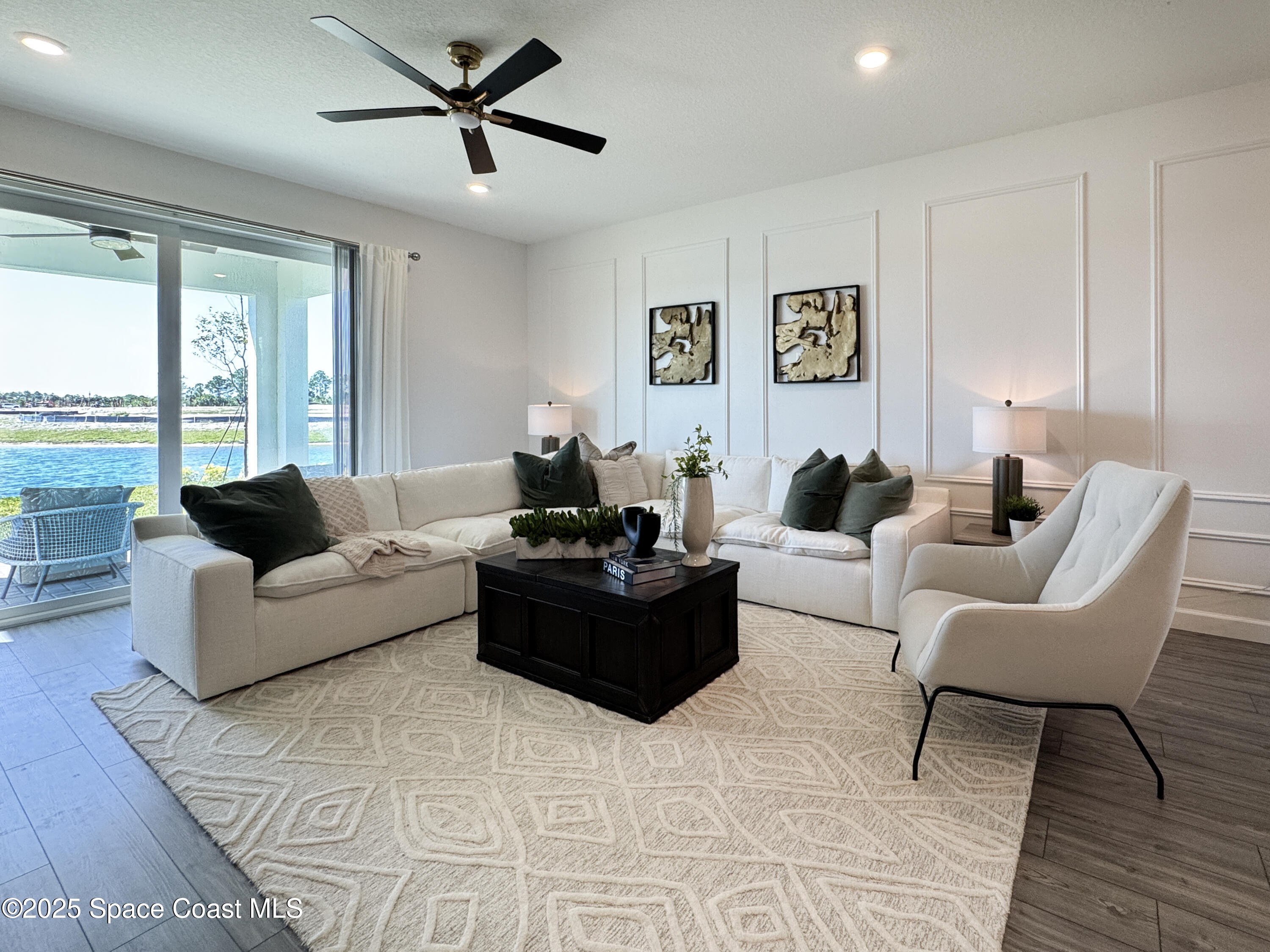 1959 Croft Inlet Drive Palm Bay, FL 32907 - Photo 8 of 23 a living room with furniture and a large window