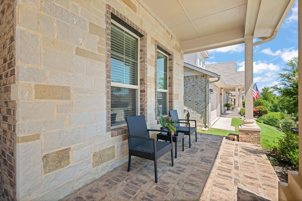 5709 Round Hl Road Denton, TX 76210 - Photo 2 of 31 a view of balcony with chairs and tables