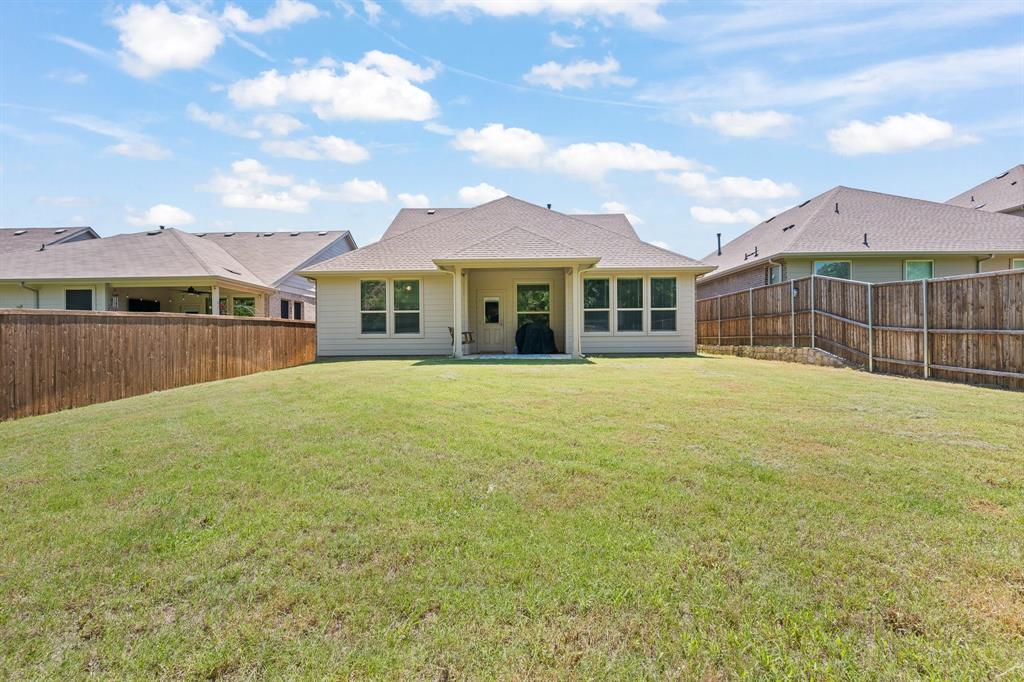 5709 Round Hl Road Denton, TX 76210 - Photo 26 of 31 a view of a house with a yard and sitting area