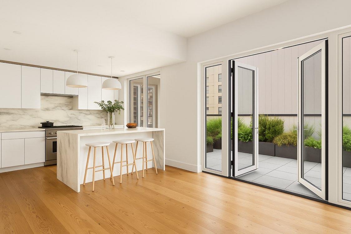 427 East 90th Street, Unit PH10 Manhattan, NY 10128 - Photo 23 of 28 a open kitchen with white cabinets and wooden floor