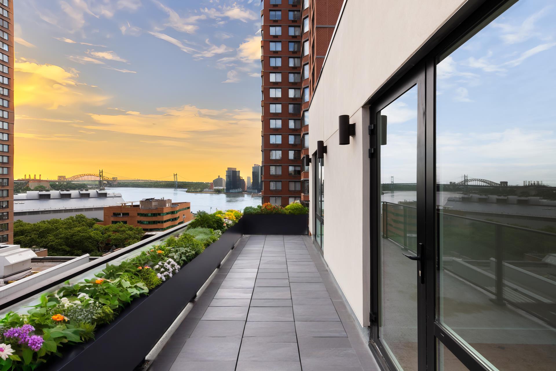 427 East 90th Street, Unit PH10 Manhattan, NY 10128 - Photo 25 of 28 a view of a balcony with city view