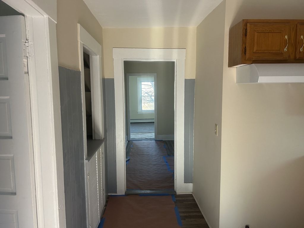 19 Pine Street Athol, MA 01331 - Photo 11 of 25 a view of a hallway with wooden floor and closet