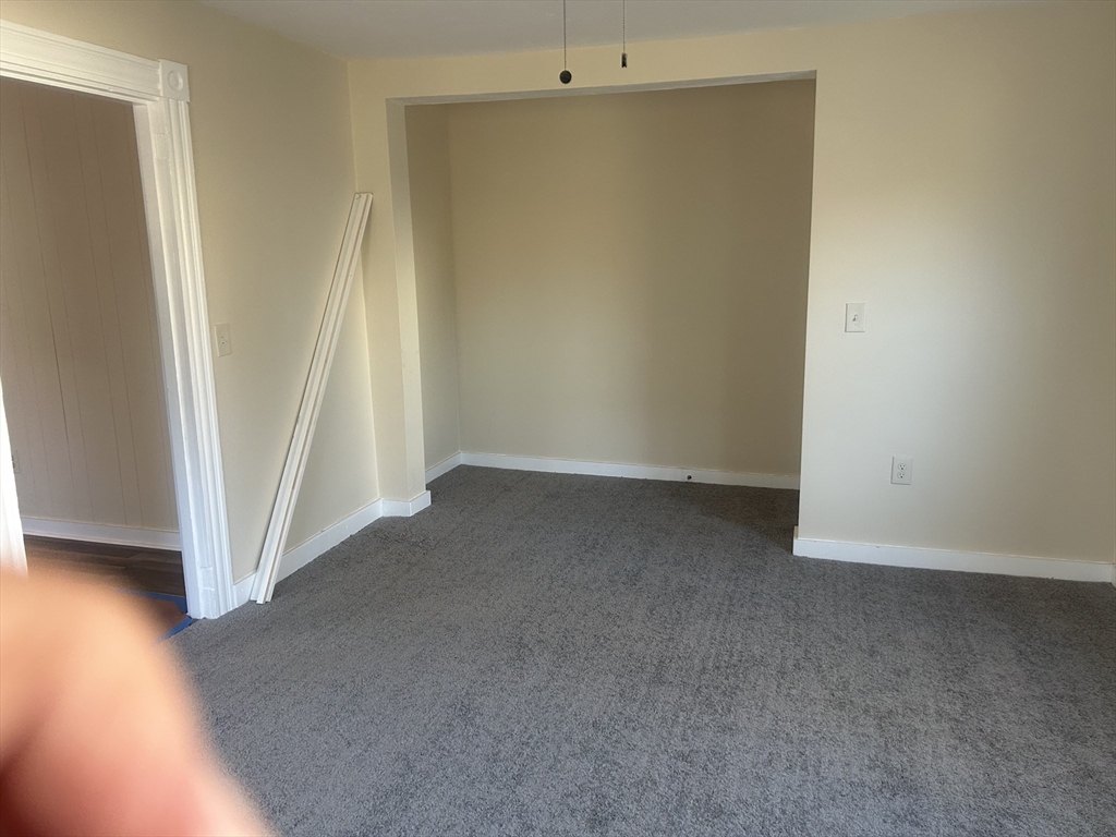 19 Pine Street Athol, MA 01331 - Photo 19 of 25 an empty room with a door