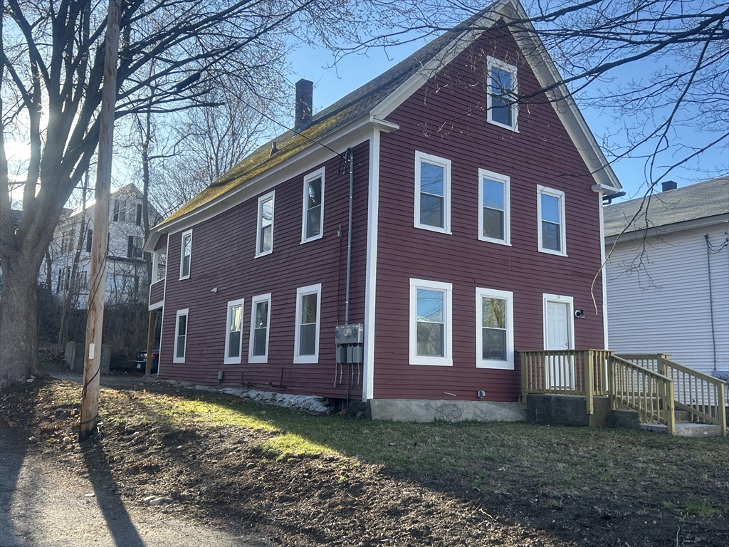 19 Pine Street Athol, MA 01331 - Photo 2 of 25 a brick building that has big trees in front of it