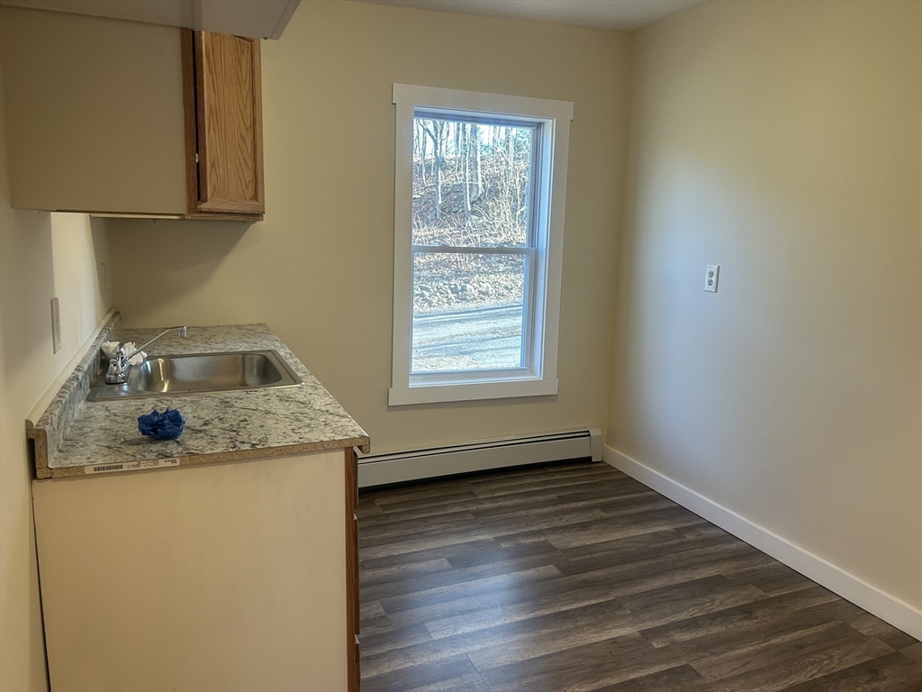 19 Pine Street Athol, MA 01331 - Photo 24 of 25 a utility room with wooden floor washer and dryer