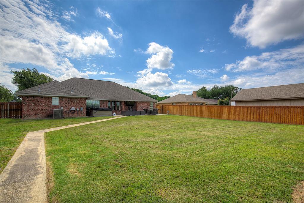 2027 Park Springs Road Sulphur Springs, TX 75482 - Photo 33 of 39 a view of a house with a big yard