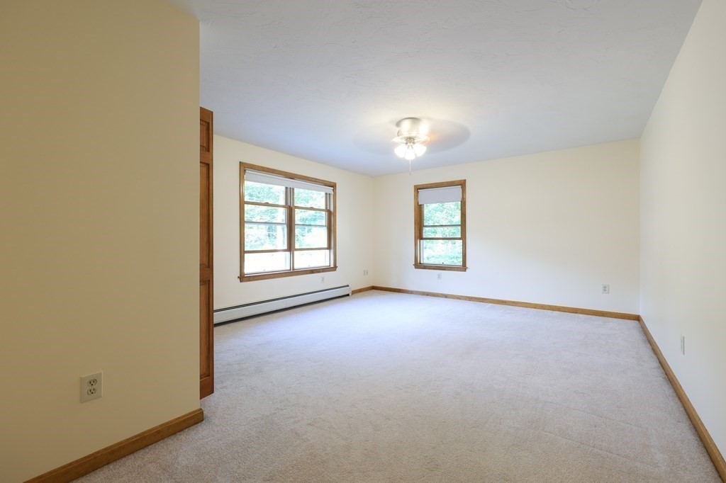 218 Lower Gore Road Webster, MA 01570 - Photo 19 of 40 an empty room with windows