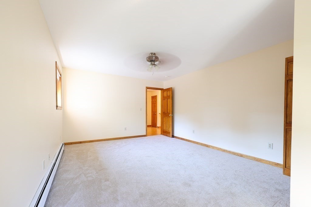 218 Lower Gore Road Webster, MA 01570 - Photo 22 of 40 a view of an empty room with a window