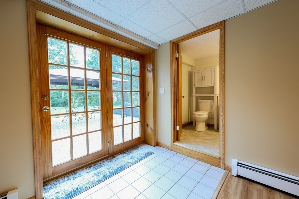 218 Lower Gore Road Webster, MA 01570 - Photo 25 of 40 a view of a bathroom with a glass door