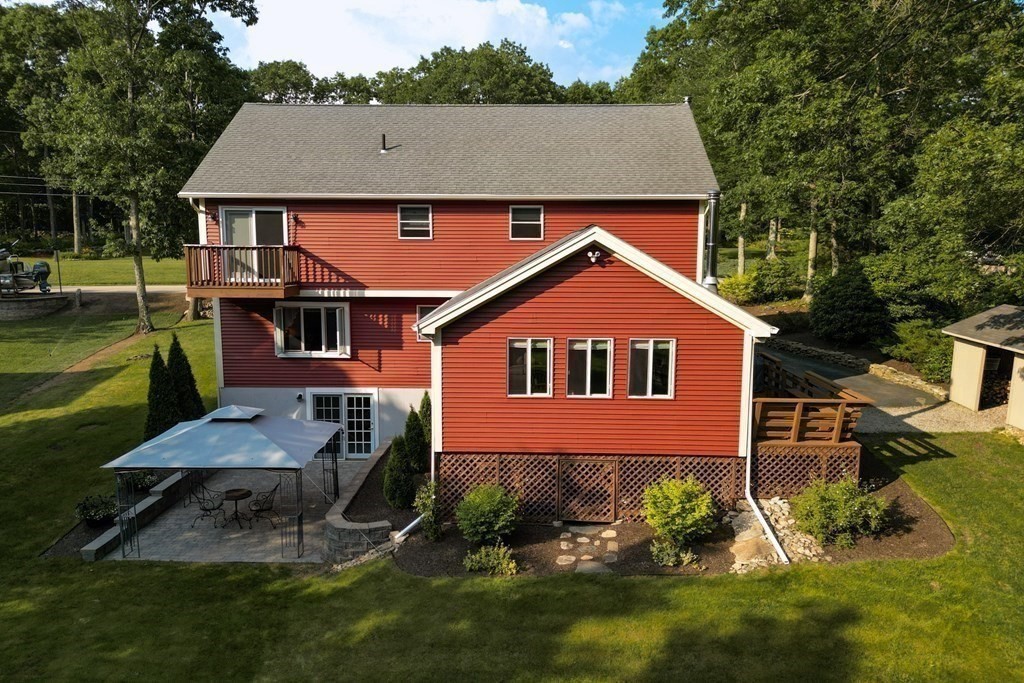 218 Lower Gore Road Webster, MA 01570 - Photo 35 of 40 a aerial view of a house next to a yard