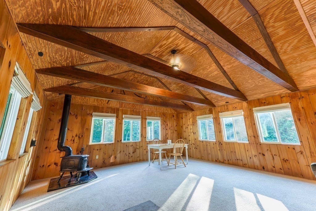 218 Lower Gore Road Webster, MA 01570 - Photo 7 of 40 a view of room with a window and furniture