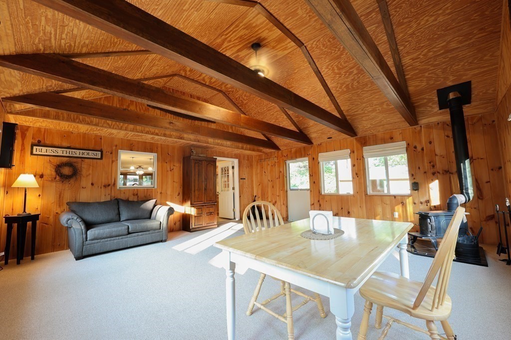 218 Lower Gore Road Webster, MA 01570 - Photo 8 of 40 a view of a dining room with furniture