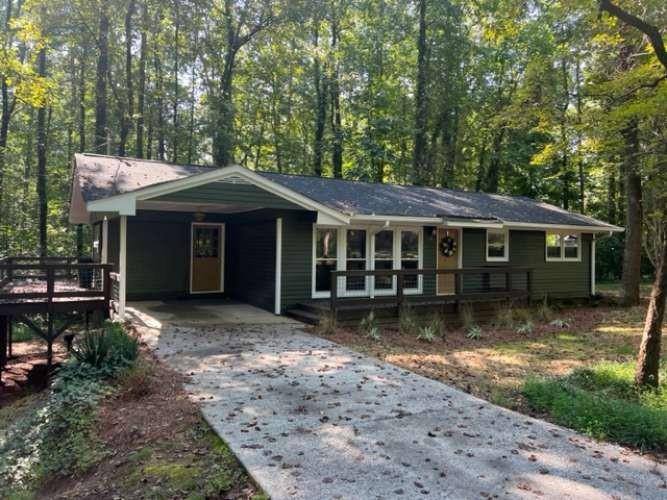 116 Alpine Way Canton, GA 30114 - Photo 1 of 1 a front view of a house with garden