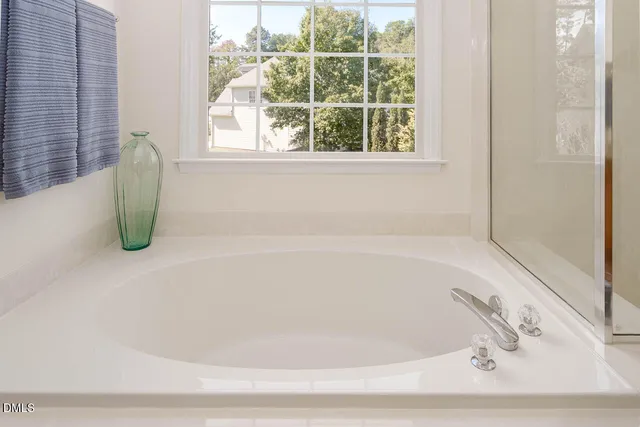 a view of a lake with a yard