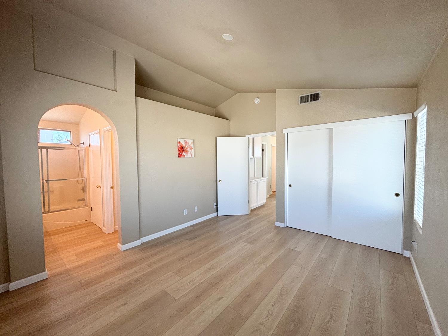 6813 Springridge Way Elk Grove, CA 95758 - Photo 15 of 26 a view of empty room with wooden floor