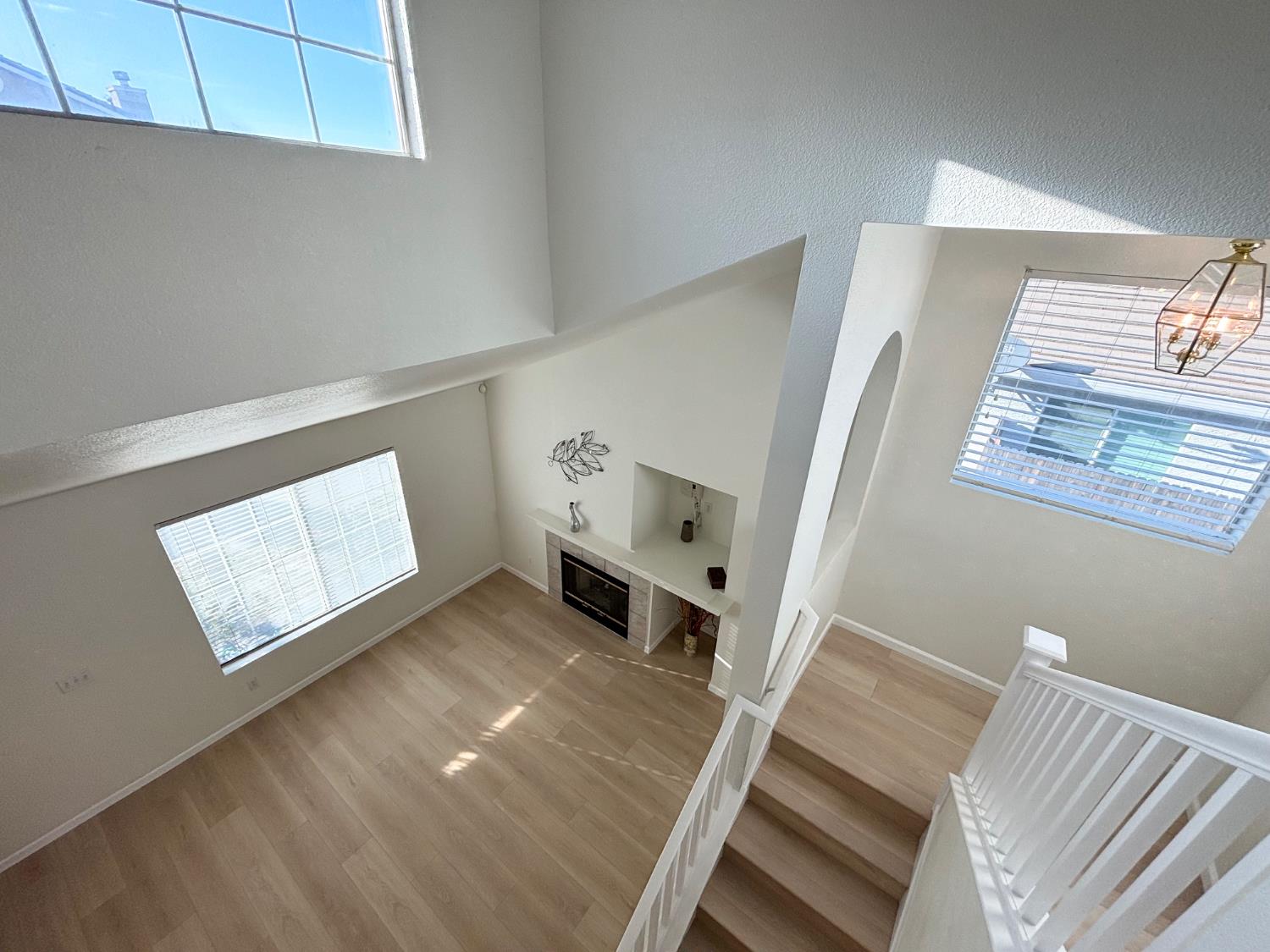 6813 Springridge Way Elk Grove, CA 95758 - Photo 19 of 26 a living room with furniture and a fireplace