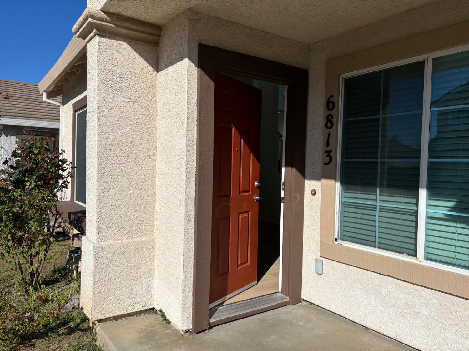 6813 Springridge Way Elk Grove, CA 95758 - Photo 2 of 26 a view of a house with a door and stairs