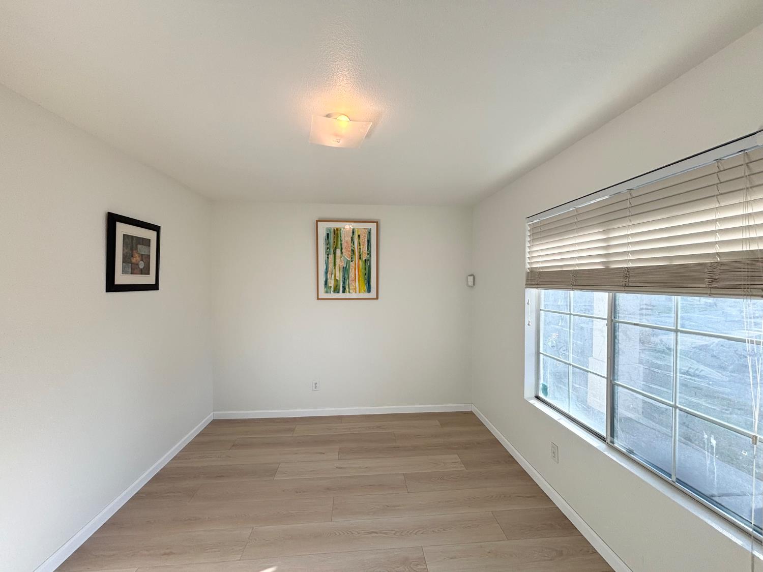 6813 Springridge Way Elk Grove, CA 95758 - Photo 5 of 26 a view of an empty room with a window