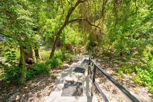 a view of a lake with a large outdoor space