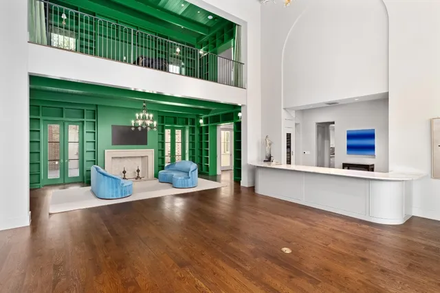 an open kitchen with a table and chairs