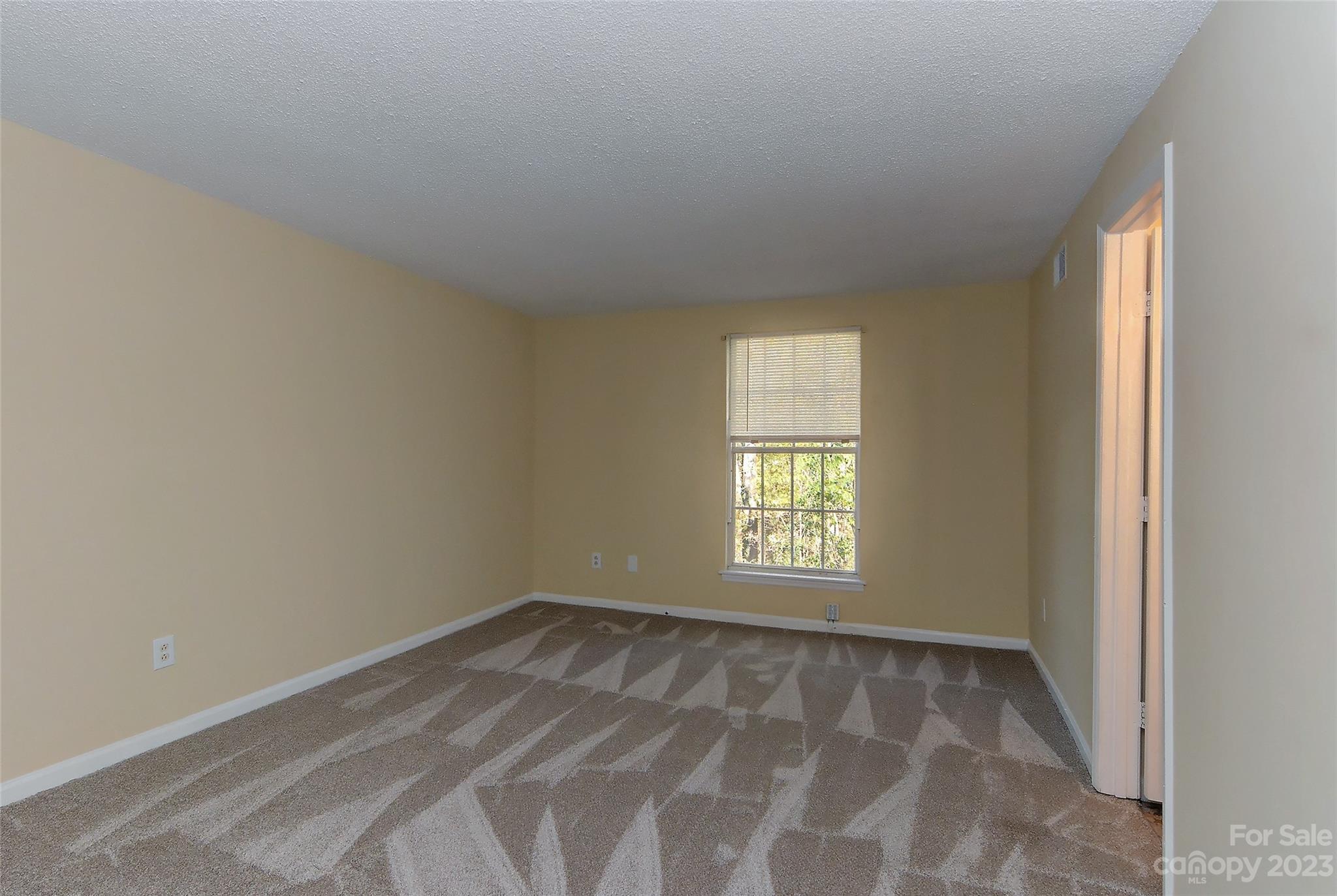 6836 Shiloh Ridge Lane Charlotte, NC 28212 - Photo 19 of 30 a view of an empty room and a window