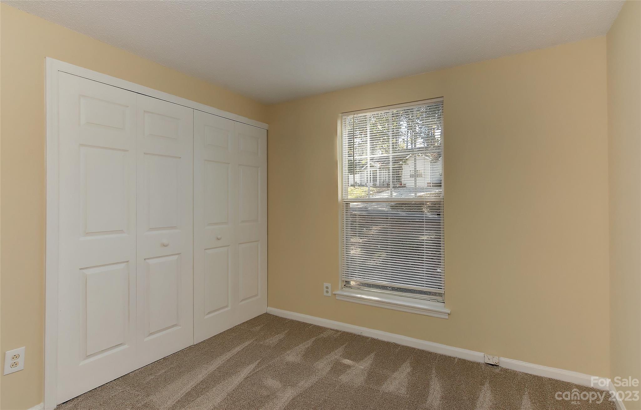 6836 Shiloh Ridge Lane Charlotte, NC 28212 - Photo 23 of 30 a view of an empty room with a window