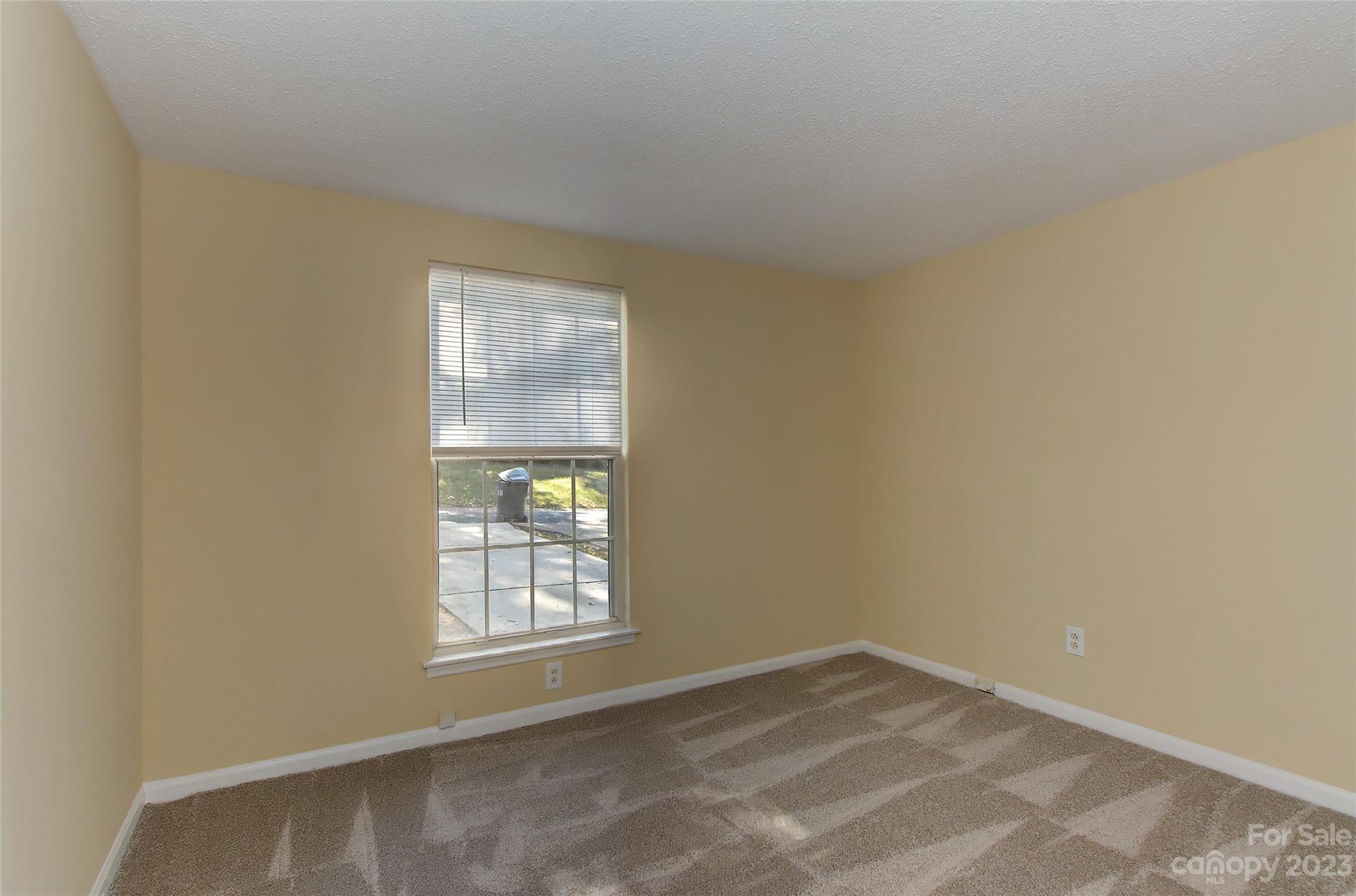 6836 Shiloh Ridge Lane Charlotte, NC 28212 - Photo 24 of 30 a view of an empty room with a window