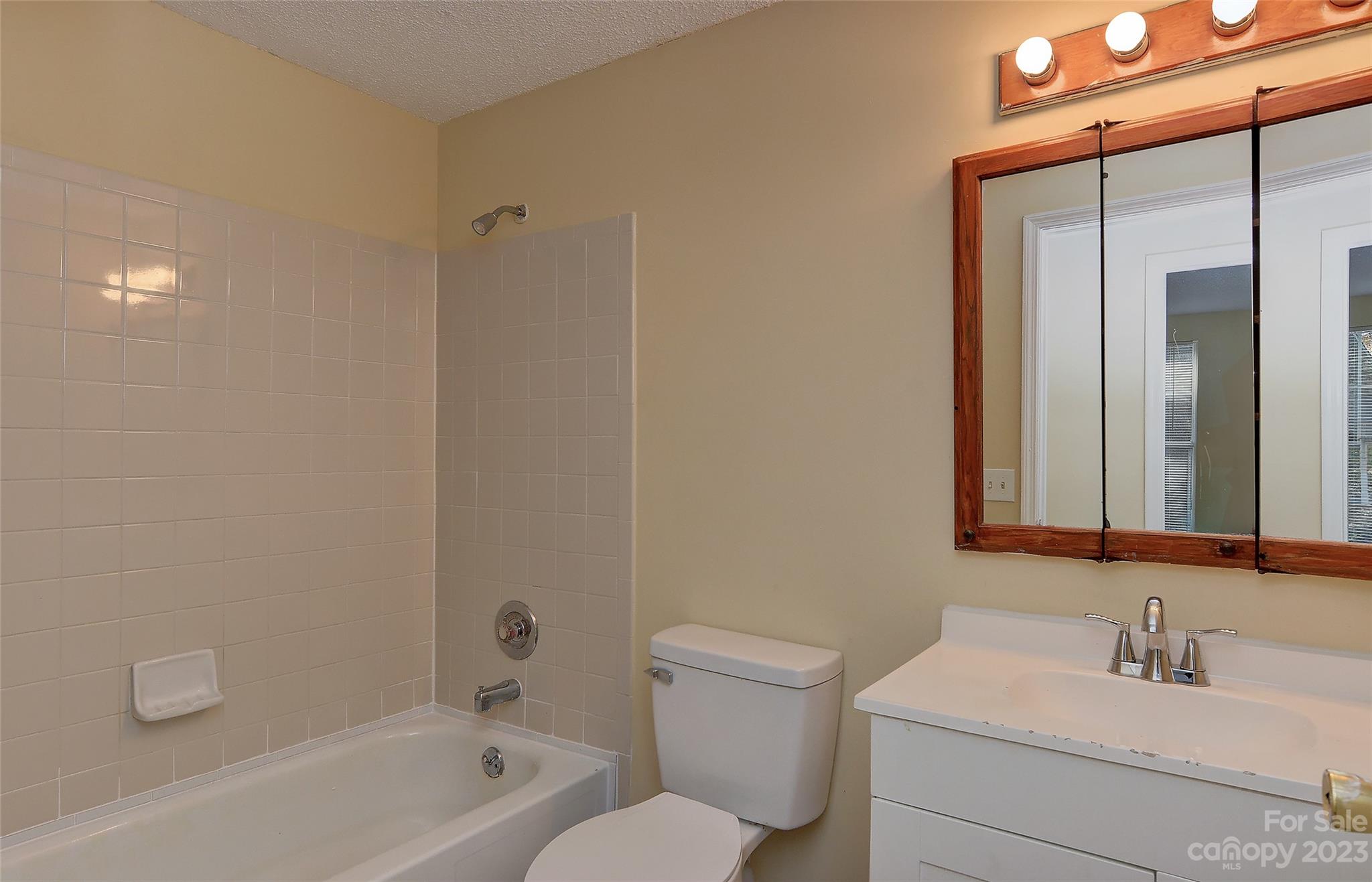 6836 Shiloh Ridge Lane Charlotte, NC 28212 - Photo 26 of 30 a bathroom with a sink toilet and shower