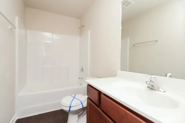 a bathroom with a sink and a bathtub