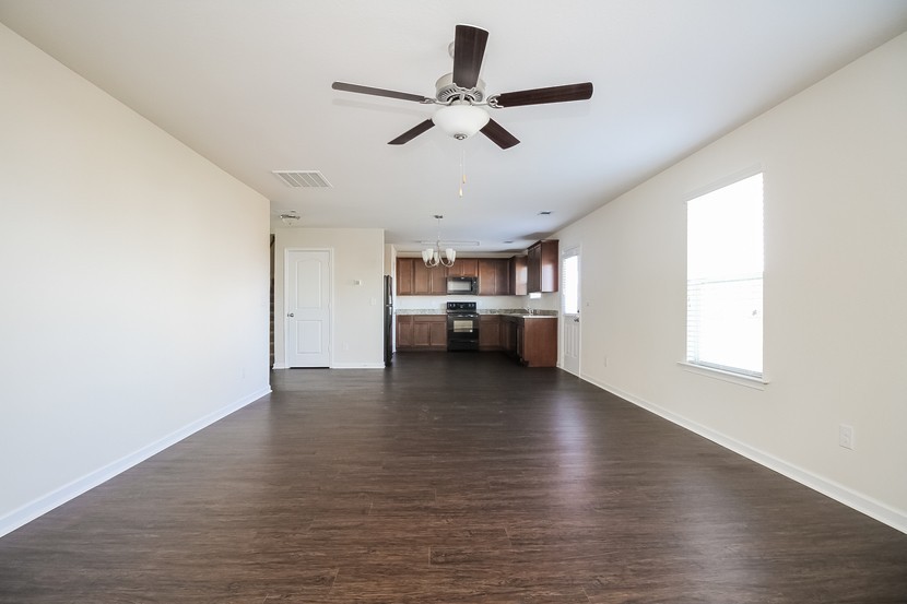 2332 Bee Hive Drive Columbia, TN 38401 - Photo 4 of 18 a view of empty room with wooden floor and window