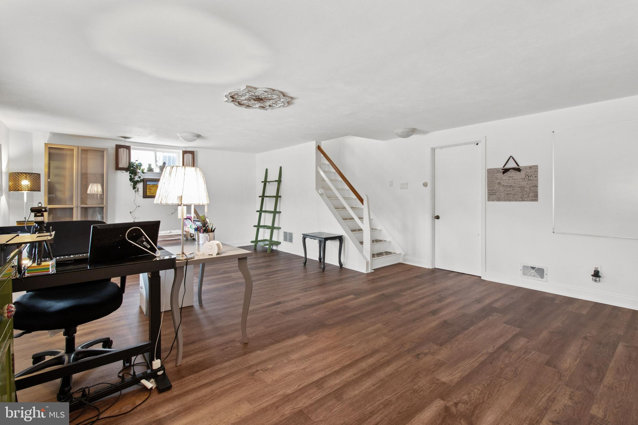 143 Ridgefield Road Newtown Square, PA 19073 - Photo 21 of 42 Finished basement with new laminate floors!